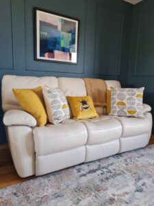 family living-room, sofa, rug, cushions, abstract art